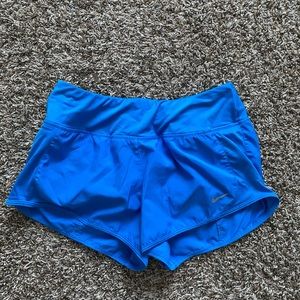Blue nike running shorts